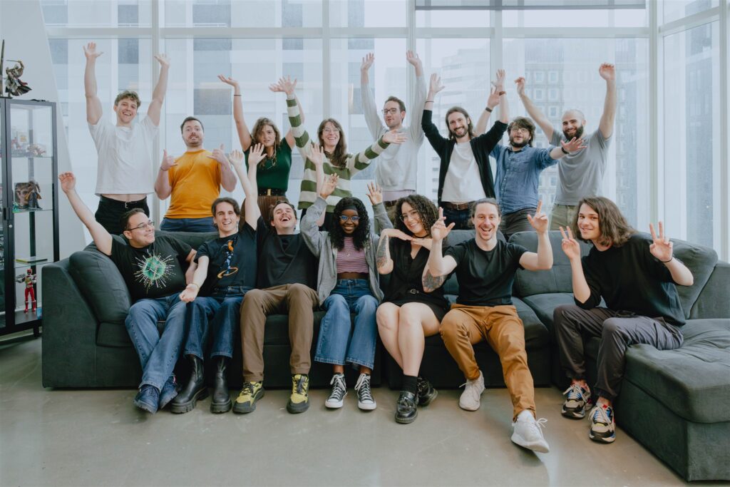 Équipe entière mentors de 15 personnes bénévoles du chapitre Montréal pose à l'école NAD, au centre-ville de Montréal.